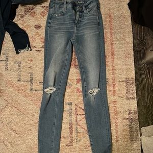 american eagle skinny jeans, size 000, holes at the knees